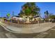 Corner lot featuring manicured lawn and desert landscaping with wrought iron fence and sidewalk at 1401 S 17Th St, Las Vegas, NV 89104