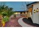 Charming single story home featuring desert landscaping, a curved walkway, and custom wall planters at 1401 S 17Th St, Las Vegas, NV 89104