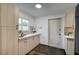 Bright kitchen with modern wood cabinets, tiled backsplash, and sleek countertops at 1401 S 17Th St, Las Vegas, NV 89104