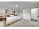Bright main bedroom featuring neutral decor, plush carpeting, and closet at 1401 S 17Th St, Las Vegas, NV 89104