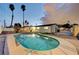 Backyard pool and patio area at dusk, perfect for outdoor relaxation at 1401 S 17Th St, Las Vegas, NV 89104