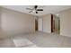 Features neutral walls, tile flooring, and a ceiling fan with light fixture at 1405 Vegas Valley Dr # 170, Las Vegas, NV 89169
