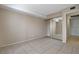 Bedroom with tile flooring, closet with mirrored doors, providing ample space at 1405 Vegas Valley Dr # 170, Las Vegas, NV 89169