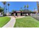 Green common area offering residents a relaxing space, gazebo, and walking path at 1405 Vegas Valley Dr # 170, Las Vegas, NV 89169