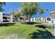 Expansive common area with mature trees and lush lawns creating a peaceful and inviting atmosphere for residents at 1405 Vegas Valley Dr # 170, Las Vegas, NV 89169