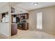 Kitchen area featuring tile flooring, dark cabinets, appliances, and granite counters at 1405 Vegas Valley Dr # 170, Las Vegas, NV 89169