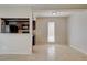 Bright open room with tile flooring, dark cabinets, granite counters, and a large window at 1405 Vegas Valley Dr # 170, Las Vegas, NV 89169