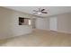A view of the open living area, which offers easy access to the kitchen and has neutral walls at 1405 Vegas Valley Dr # 170, Las Vegas, NV 89169