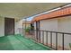 Outdoor patio featuring artificial turf and black metal railing at 1405 Vegas Valley Dr # 170, Las Vegas, NV 89169