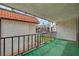 Outdoor patio featuring artificial turf and black metal railing, with view of complex at 1405 Vegas Valley Dr # 170, Las Vegas, NV 89169