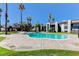 Exterior presents a community pool area, accented by palm trees and Mediterranean-style condo buildings at 1405 Vegas Valley Dr # 170, Las Vegas, NV 89169