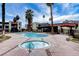 Exterior showcases a community pool and hot tub area with desert landscaping and nearby residential building at 1405 Vegas Valley Dr # 170, Las Vegas, NV 89169