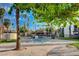 Image reveals a community pool area with palm trees, and views of the residential condo buildings at 1405 Vegas Valley Dr # 170, Las Vegas, NV 89169