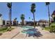 Exterior showcases a community pool and spa area with palm trees and mediterranean-style condo buildings at 1405 Vegas Valley Dr # 170, Las Vegas, NV 89169