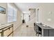 Bright living area with tile floors, staircase, and plenty of natural light at 1422 Ozzie Smith Ave, Henderson, NV 89074