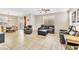 Open-concept living room and dining area offers plenty of space for entertaining at 1422 Ozzie Smith Ave, Henderson, NV 89074