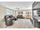 Bright and open living room featuring ample seating and natural light at 1422 Ozzie Smith Ave, Henderson, NV 89074