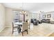 Open-concept living space joining dining area with living room at 1422 Ozzie Smith Ave, Henderson, NV 89074