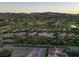 Expansive aerial view of the community featuring lush golf courses and luxurious homes at 15 Via Mantova # 104, Henderson, NV 89011