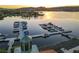 Scenic view of boat docks at sunset with lakefront condos in the background at 15 Via Mantova # 104, Henderson, NV 89011