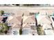 Aerial view of a residential neighborhood featuring terracotta roofs and landscaped yards at 1730 Juniper Twig Ave, Las Vegas, NV 89183