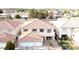 Inviting two-story home with a three car garage and a small second story balcony at 1730 Juniper Twig Ave, Las Vegas, NV 89183