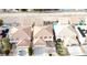 Aerial view of a residential neighborhood featuring terracotta roofs and landscaped yards at 1730 Juniper Twig Ave, Las Vegas, NV 89183