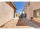Cozy backyard patio featuring stone landscaping, dining table, and spa at 1730 Juniper Twig Ave, Las Vegas, NV 89183