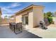 Backyard patio features a dining table and a barbeque at 1730 Juniper Twig Ave, Las Vegas, NV 89183