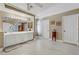 Bright bathroom with double sinks, large mirror, and tile flooring at 1730 Juniper Twig Ave, Las Vegas, NV 89183