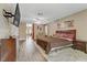 Spacious main bedroom featuring hardwood floors and comfortable, modern furnishings at 1730 Juniper Twig Ave, Las Vegas, NV 89183
