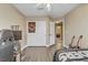 Nicely decorated bedroom with wood floors, ceiling fan, a bed, and closet, perfect for relaxation at 1730 Juniper Twig Ave, Las Vegas, NV 89183