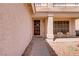 Charming covered front porch with seating area, perfect for enjoying the outdoors at 1730 Juniper Twig Ave, Las Vegas, NV 89183