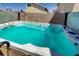 Beautiful hot tub in the backyard with turquoise water, perfect for relaxation at 1730 Juniper Twig Ave, Las Vegas, NV 89183