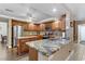 Well-lit kitchen showcasing an island and stylish cabinets at 1730 Juniper Twig Ave, Las Vegas, NV 89183