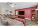 Bright living room with large comfortable sectional and decorative accents at 1730 Juniper Twig Ave, Las Vegas, NV 89183