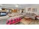 Cozy living room featuring a spacious sectional sofa and open layout at 1730 Juniper Twig Ave, Las Vegas, NV 89183