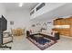 Large living space boasts ample seating, kitchenette, and dining area for flexible living at 1730 Juniper Twig Ave, Las Vegas, NV 89183