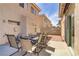 A relaxing outdoor patio with a seating area at 1730 Juniper Twig Ave, Las Vegas, NV 89183