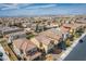 Expansive aerial view of a well-maintained neighborhood with a mix of home styles and landscaped yards at 1819 Wild Grain Ave, North Las Vegas, NV 89086