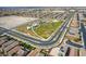 Aerial view of a neighborhood park featuring a playground, open green space, and community gathering areas at 1819 Wild Grain Ave, North Las Vegas, NV 89086
