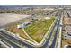 Overhead of community park with a playground, open green space, and walking paths for neighborhood enjoyment at 1819 Wild Grain Ave, North Las Vegas, NV 89086
