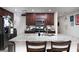 Bright kitchen with granite island, stainless steel appliances and plenty of counter space at 1819 Wild Grain Ave, North Las Vegas, NV 89086