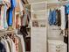 Walk-in closet with ample shelving, hanging space, and built-in storage solutions for organization at 1973 Ardilea St, Las Vegas, NV 89135