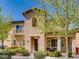 Charming two-story home with a balcony and a landscaped front yard, perfect for enjoying the outdoors at 1973 Ardilea St, Las Vegas, NV 89135