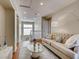 Cozy living area with plush sofa, stylish coffee table, and sunlit staircase at 1973 Ardilea St, Las Vegas, NV 89135