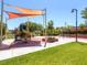 Community playground with shade structures, swings, and slide for fun outdoor activities at 1973 Ardilea St, Las Vegas, NV 89135