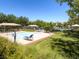 Community pool area provides fun in the sun with sunbathing and lush landscaping at 1973 Ardilea St, Las Vegas, NV 89135