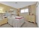 Cozy bedroom featuring matching dressers and nightstands, with a queen size bed at 2012 Wendell Ave, Las Vegas, NV 89101