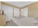 Comfortable bedroom showcasing a queen size bed and closet with sliding doors at 2012 Wendell Ave, Las Vegas, NV 89101